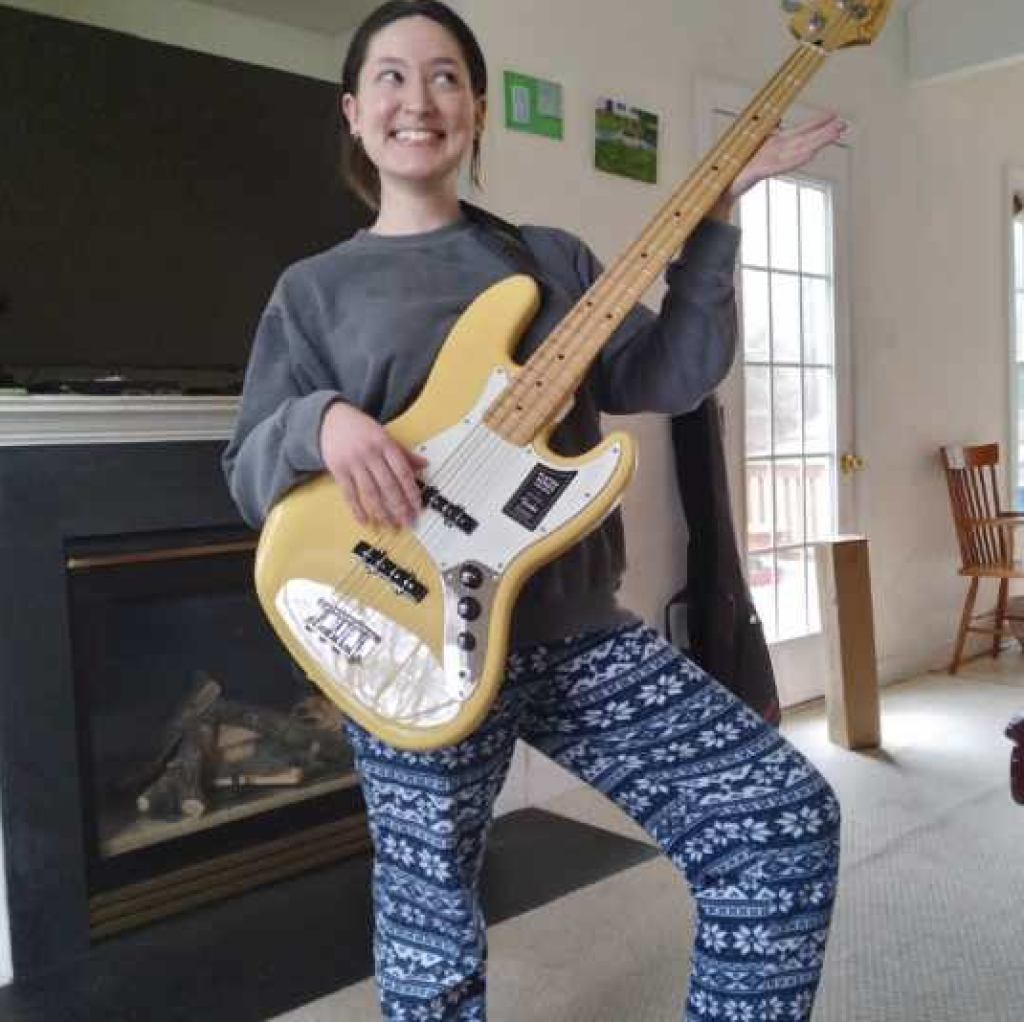 Lisa Harshberger (Lilly holding Bass) – Fender Jazz Bass in Buttercream